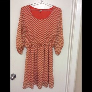Expresso Orange and cream dress.